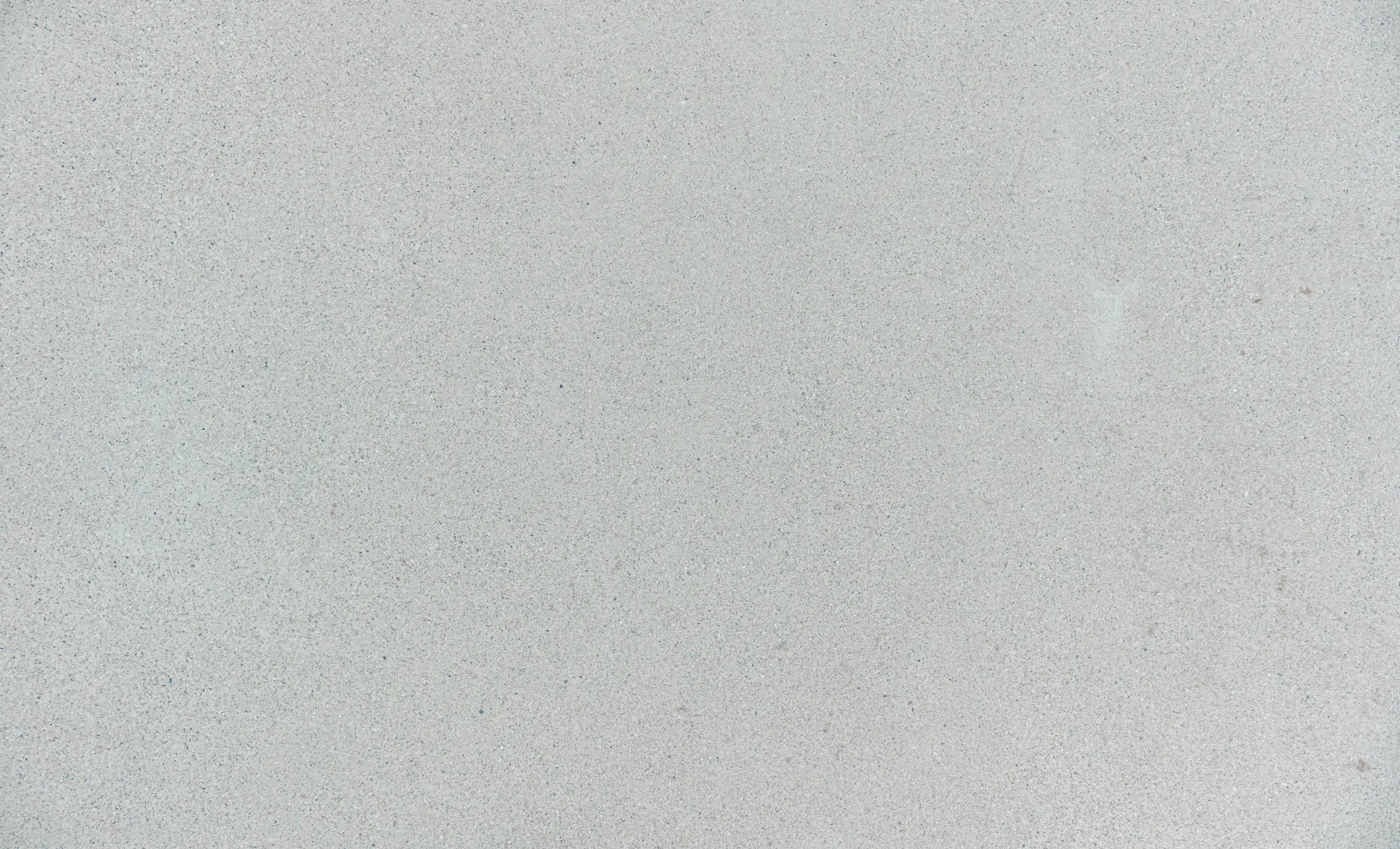 Industry context: Fine-grained grey concrete surface.